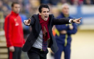 Sevilla's coach Unai Emery reacts during the Spanish league football match Villarreal CF vs Sevilla FC at El Madrigal stadium in Villareal on December 21, 2013.   AFP PHOTO/ JOSE JORDAN        (Photo credit should read JOSE JORDAN/AFP/Getty Images)